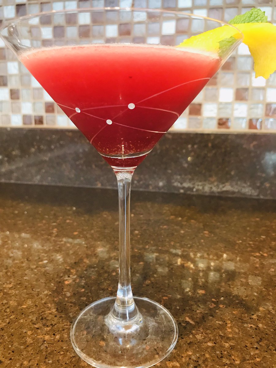 Set of two Galaxy Spirals Martini Glasses with intricate spiral design and crystal stones, elegantly displayed in a gift box.