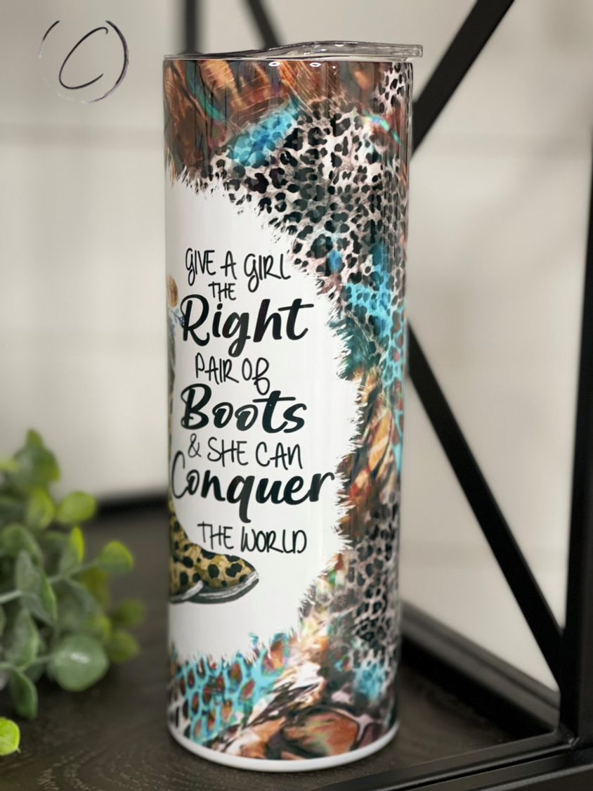 Stylish 20oz skinny tumbler with a unique design featuring boots, perfect for hot and cold beverages.