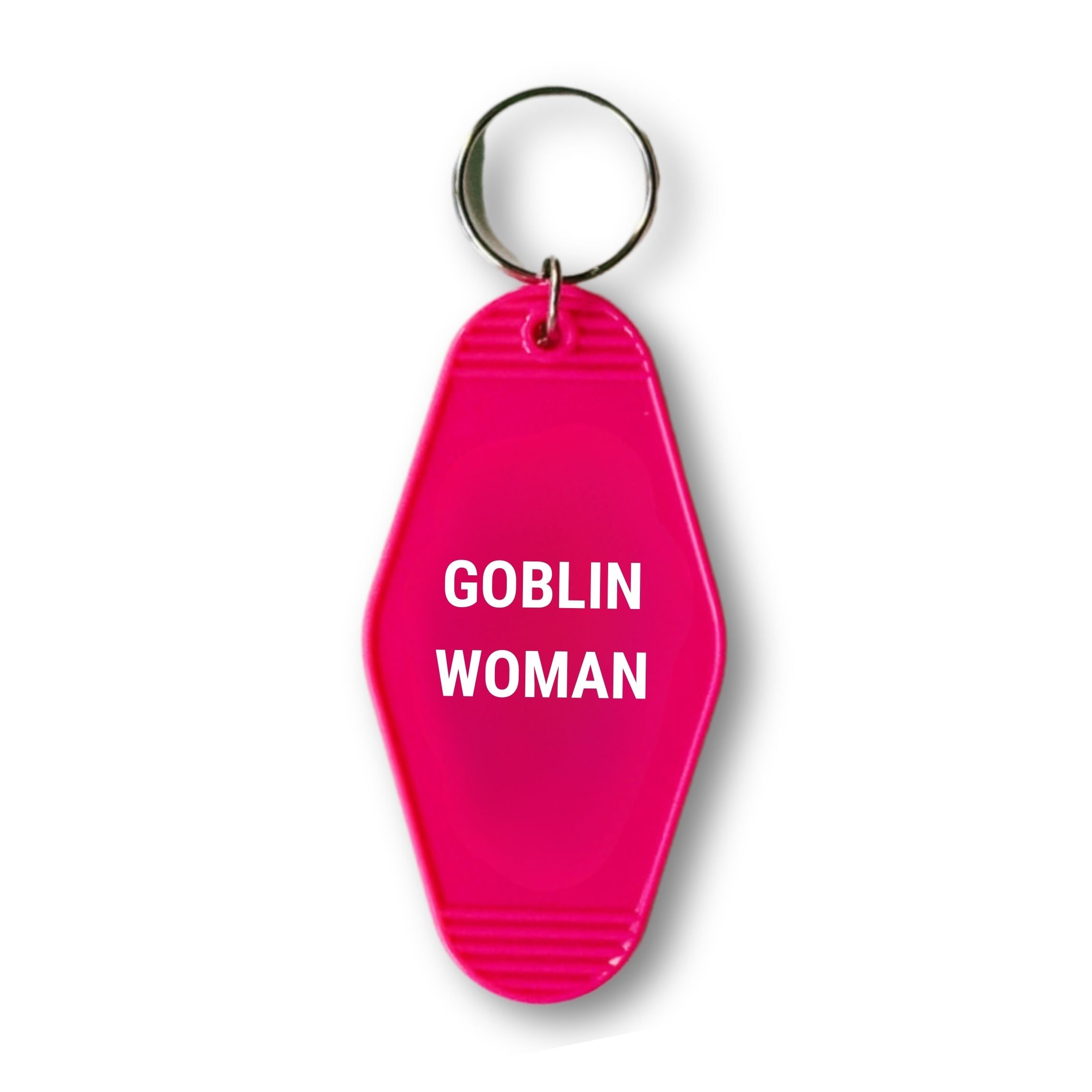 Fuchsia pink Goblin Woman motel style keychain on a split ring, featuring a classic motel design with 'GET BULLISH' text on the back.