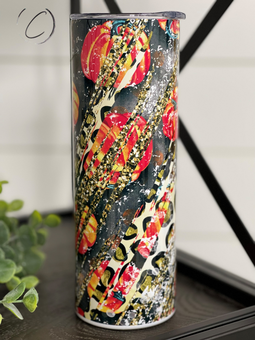Gold Leopard Pumpkin Patch 20oz Skinny Tumbler with a stylish design, featuring a gold leopard print and a reusable straw.