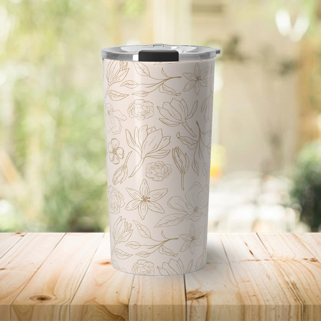 Gold Magnolia Travel Coffee Mug in stainless steel with elegant wraparound artwork, perfect for hot and cold beverages.