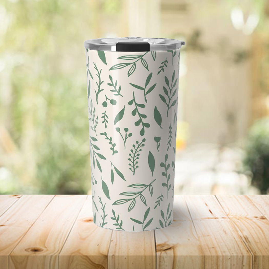 Green Falling Leaves Travel Coffee Mug made of stainless steel with a beautiful leaf design, perfect for hot or cold beverages.