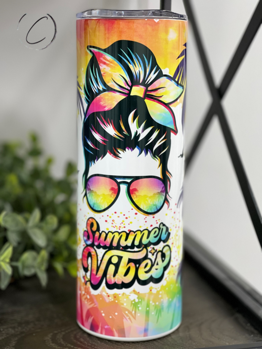 A colorful Groovy Summer Vibes 20oz Skinny Tumbler with a vibrant design, featuring a reusable straw, perfect for summer drinks.