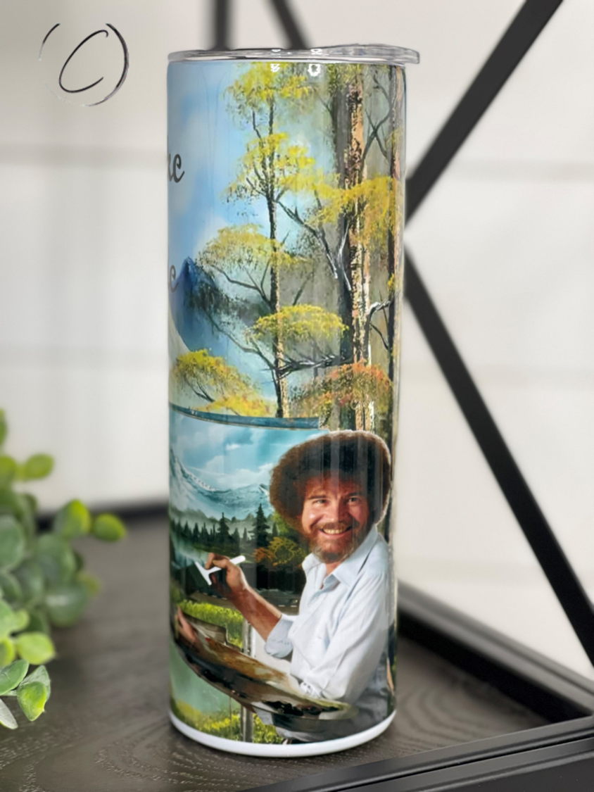Happy Accidents Bob Ross 20oz Skinny Tumbler with artistic design and reusable straw.