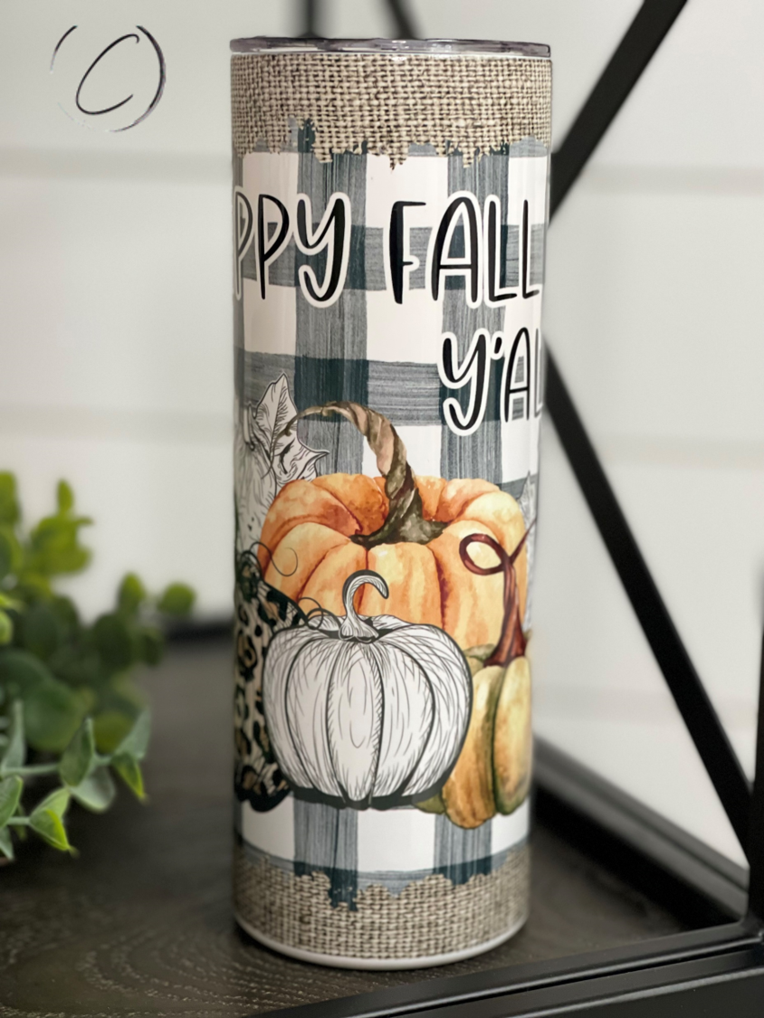 Happy Fall Y'all 20oz UV Orange Skinny Tumbler with color-changing effect in sunlight, featuring a festive autumn design.