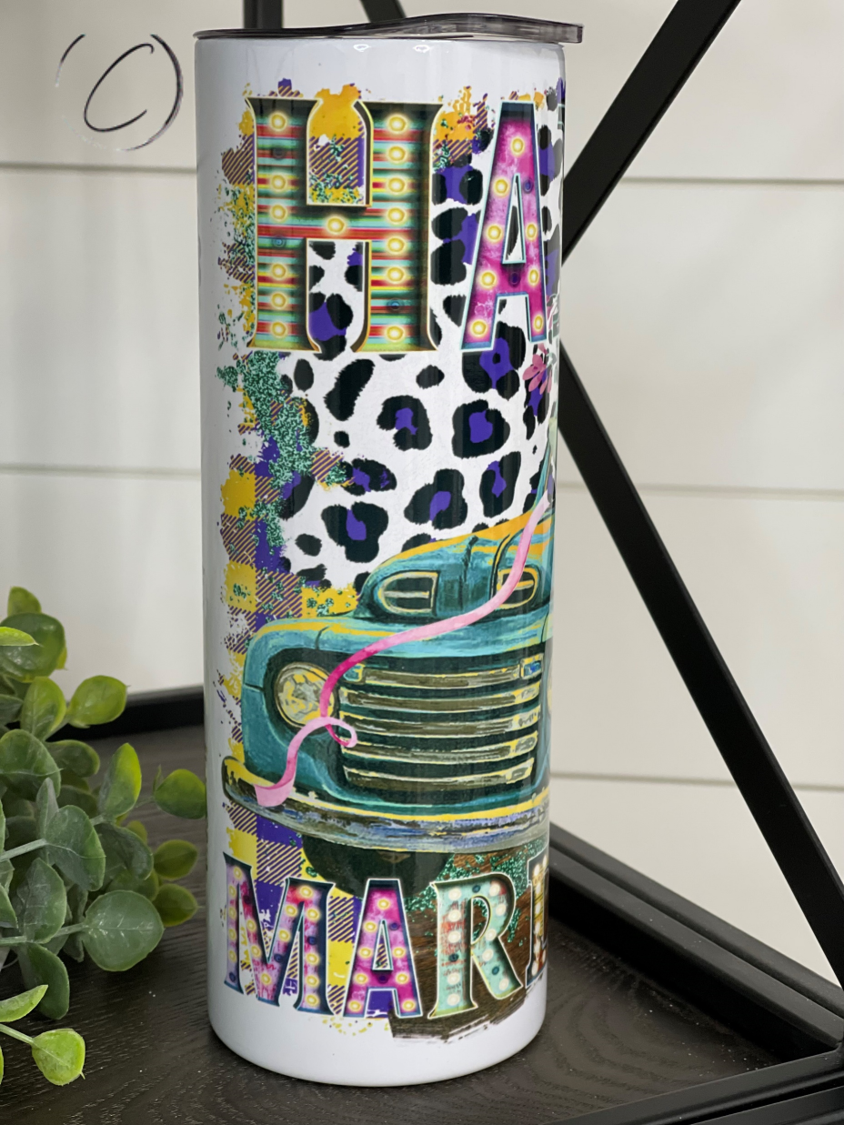 Happy Mardi Gras Truck 20oz Skinny Tumbler featuring vibrant colors and a festive design, perfect for drinks on the go.