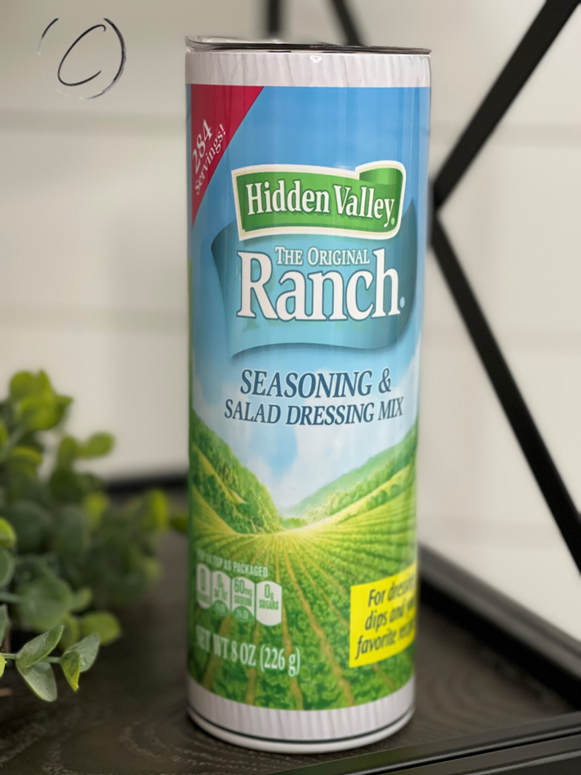 Hidden Valley Ranch 20oz Skinny Tumbler with full wrap design and reusable straw, showcasing its durable and stylish features.