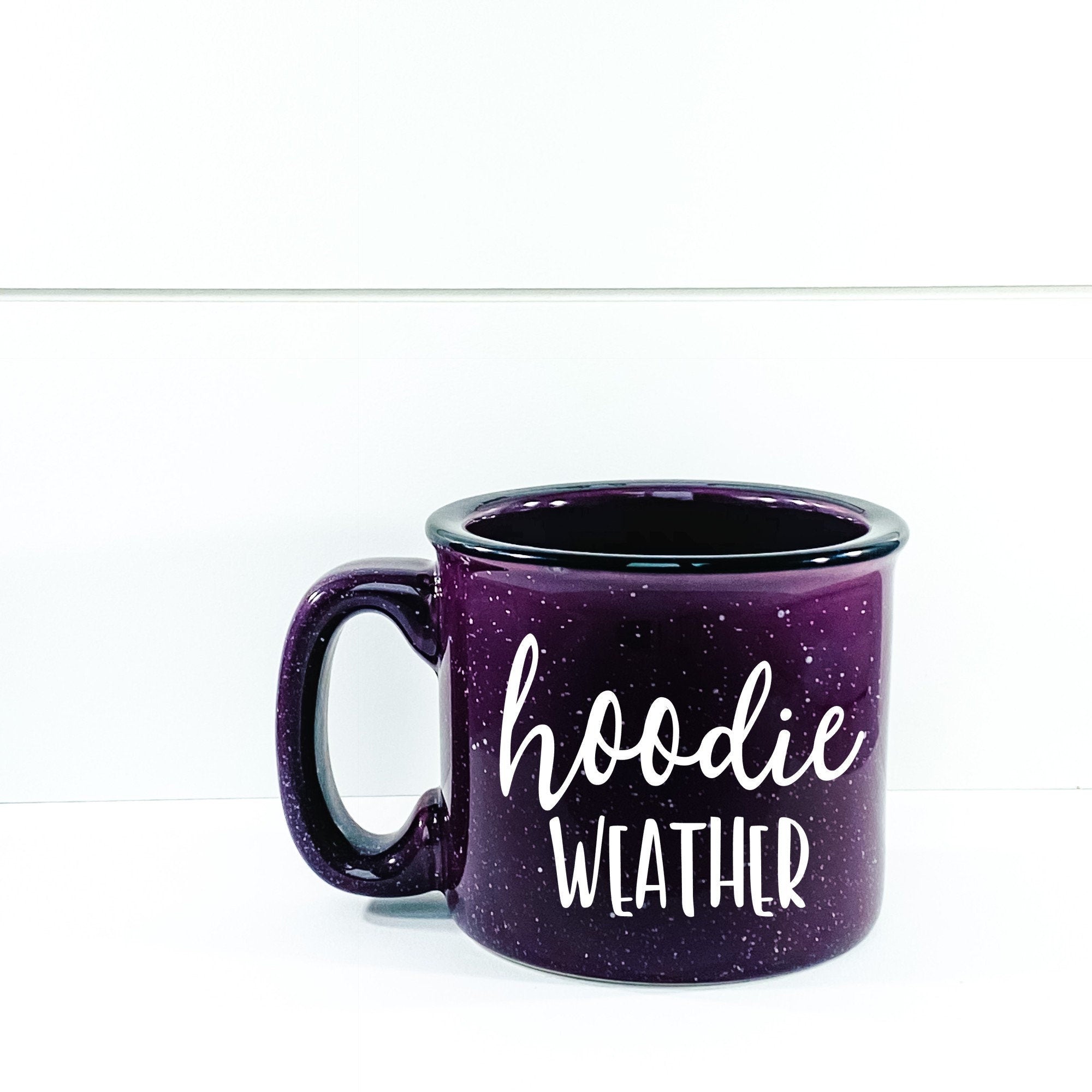 A cozy ceramic campfire mug with a unique design, perfect for warm beverages.