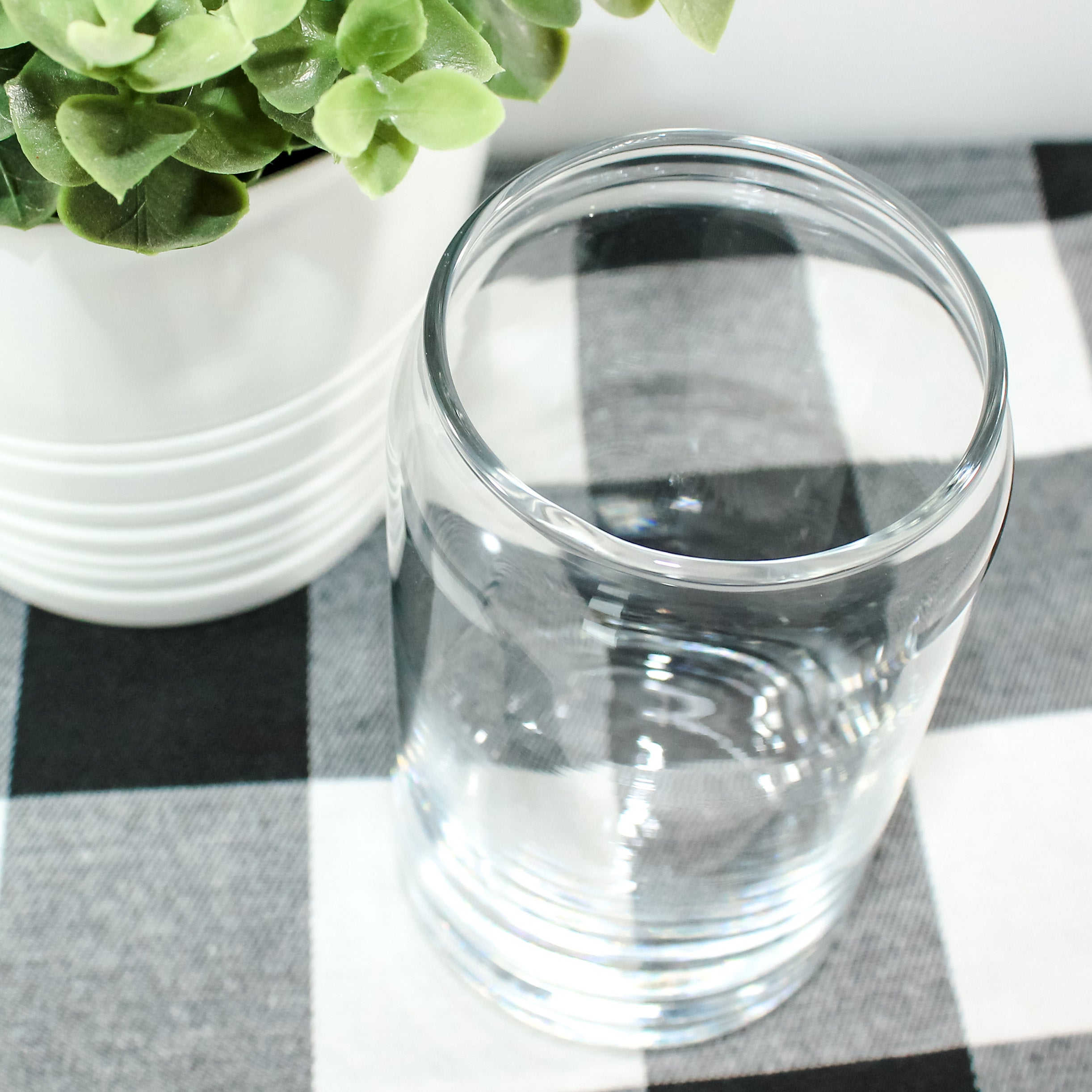 A colorful Holographic Smile Wrap Can Glass showcasing a vibrant design, perfect for drinks.