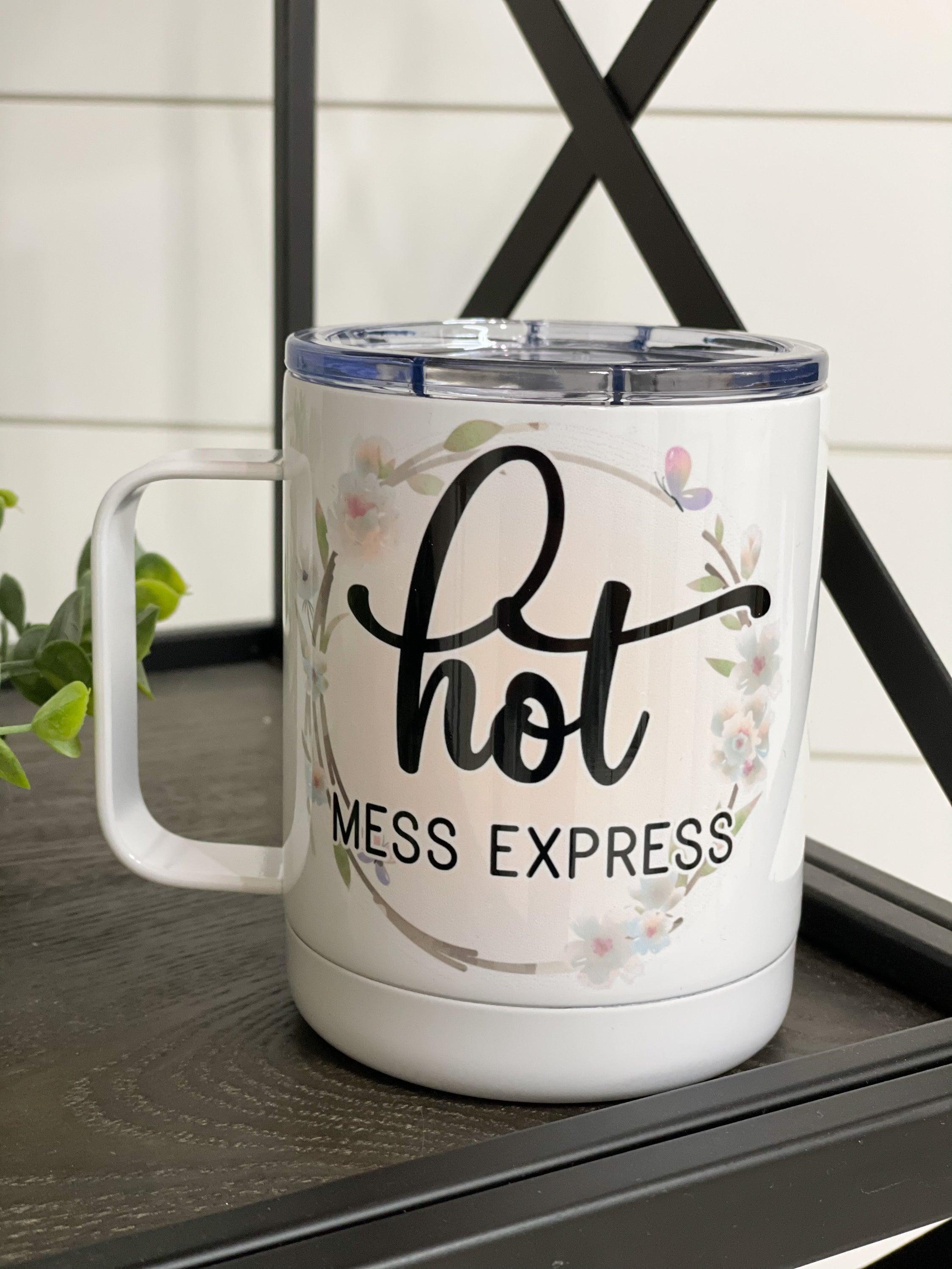 Hot Mess Express 11oz Travel Mug featuring a fun design on both sides, perfect for travel and daily use.