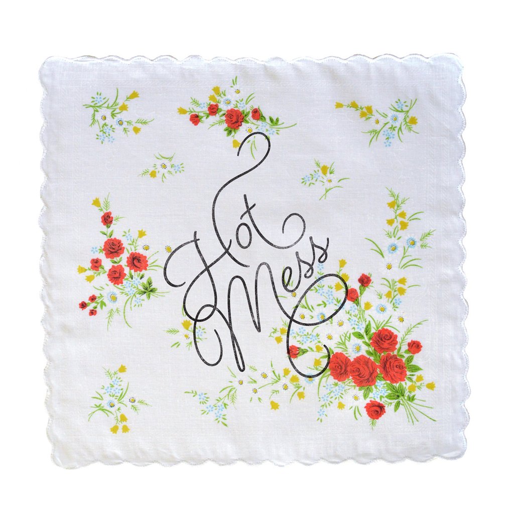 Hot Mess Hankie featuring a retro floral print design in cotton, measuring 12" x 12", with the phrase 'Hot Mess' in Beloved Script.