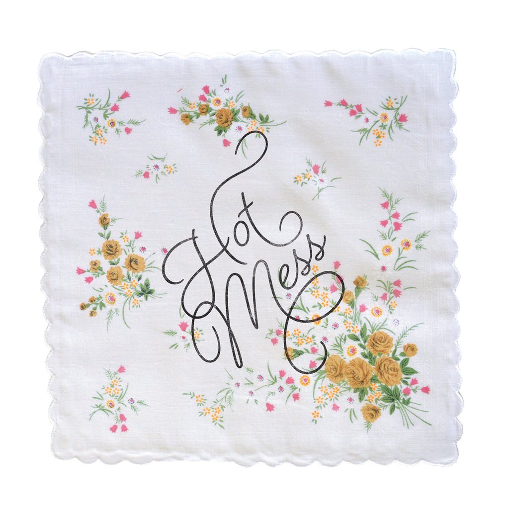 Hot Mess Hankie featuring a retro floral print design in cotton, measuring 12" x 12", with the phrase 'Hot Mess' in Beloved Script.