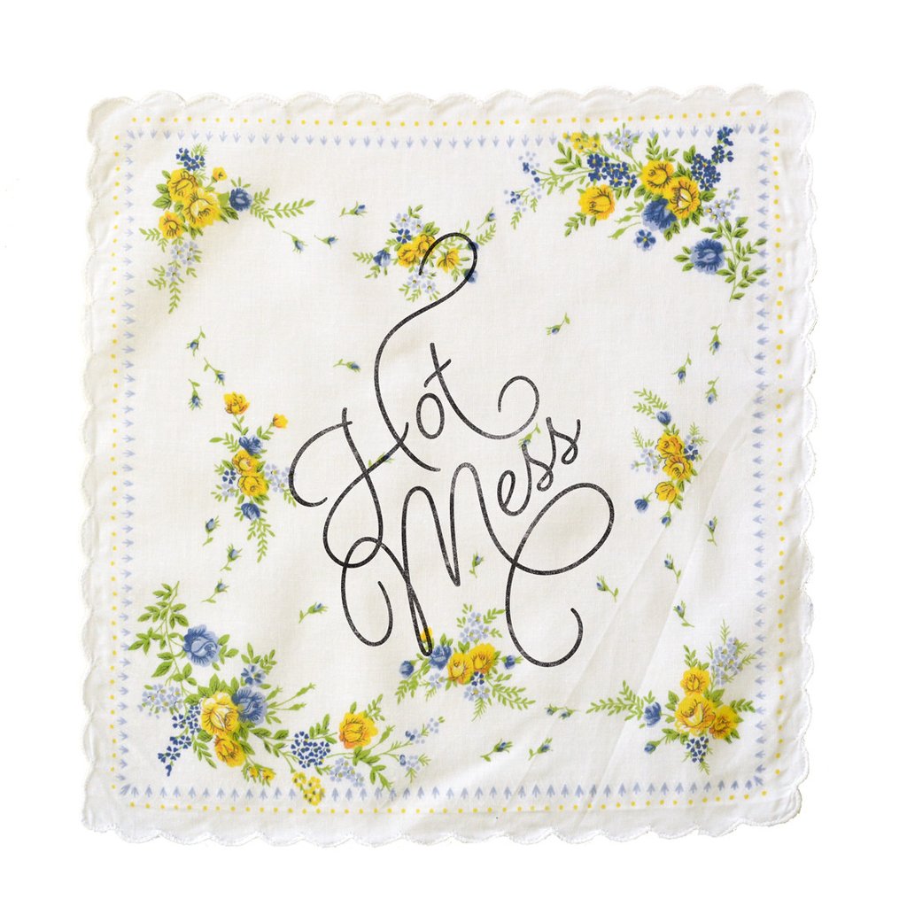 Hot Mess Hankie featuring a retro floral print design in cotton, measuring 12" x 12", with the phrase 'Hot Mess' in Beloved Script.