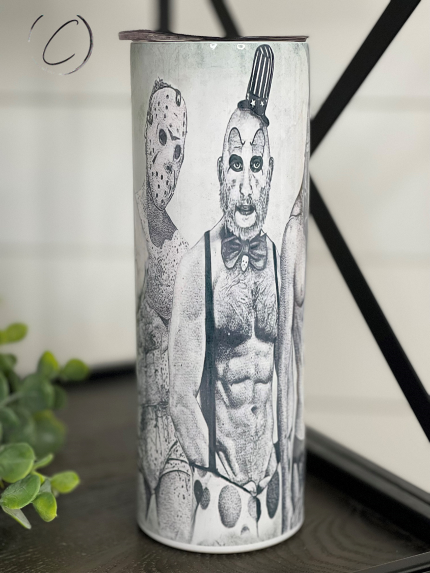 Hunks Of Horror 20oz Skinny Tumbler featuring a unique horror-themed design, complete with a reusable straw.