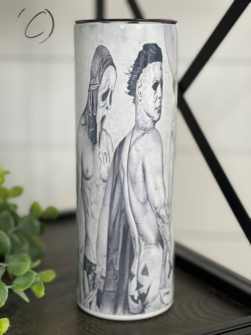 Hunks Of Horror 20oz Skinny Tumbler featuring a unique horror-themed design, complete with a reusable straw.