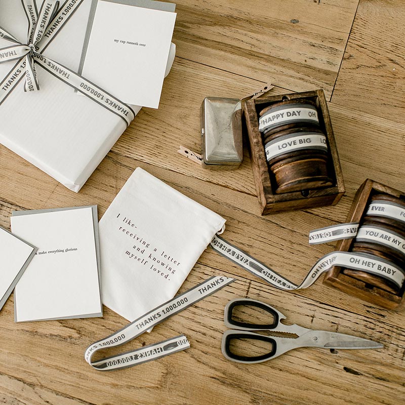 I Like Receiving A Letter Greeting Card Set featuring six unique letterpressed cards and matching envelopes in a cotton drawstring bag.