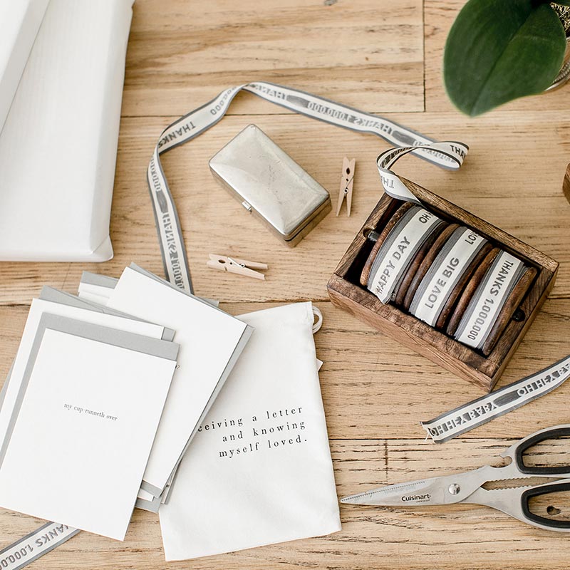 I Like Receiving A Letter Greeting Card Set featuring six unique letterpressed cards and matching envelopes in a cotton drawstring bag.