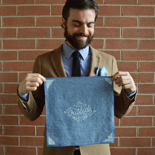 Stylish chambray pocket square with the quote 'I'm always outside on the inside', perfect for men's formal wear.