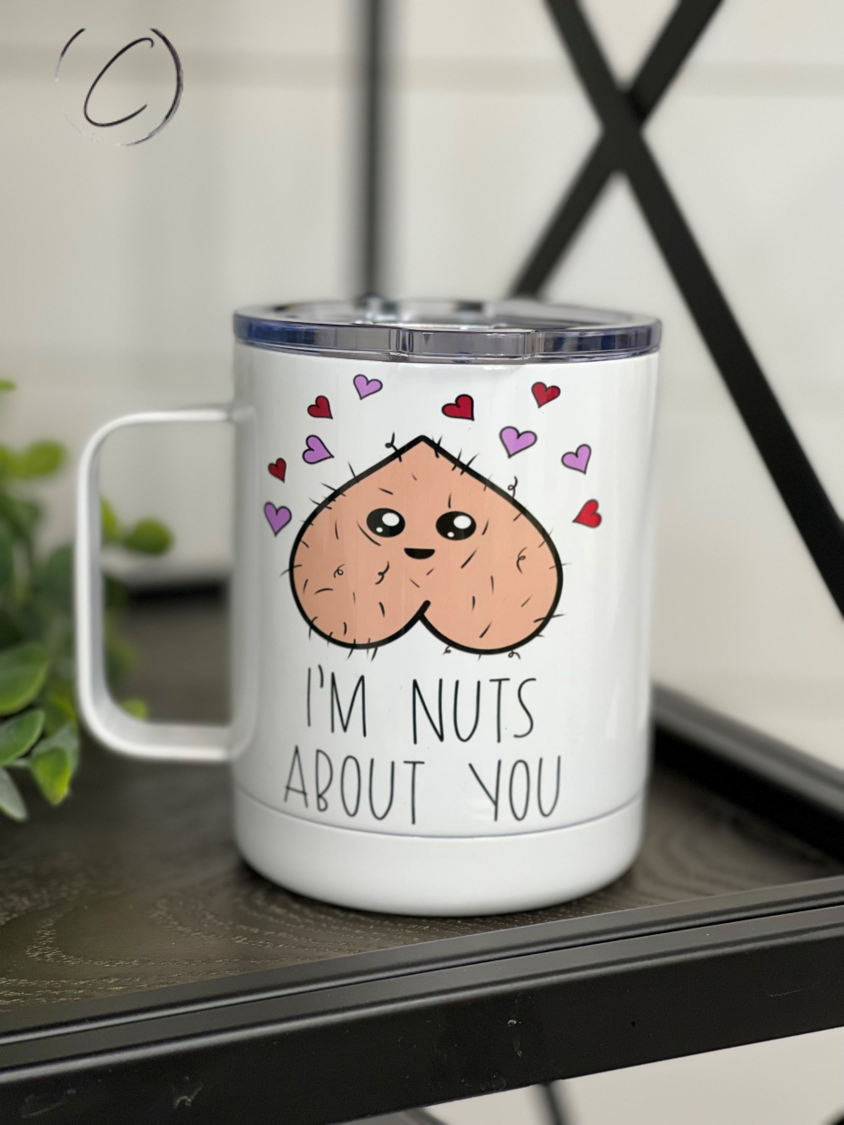I'm Nuts About You 11oz Travel Mug featuring a charming design on both sides, perfect for travel and everyday use.