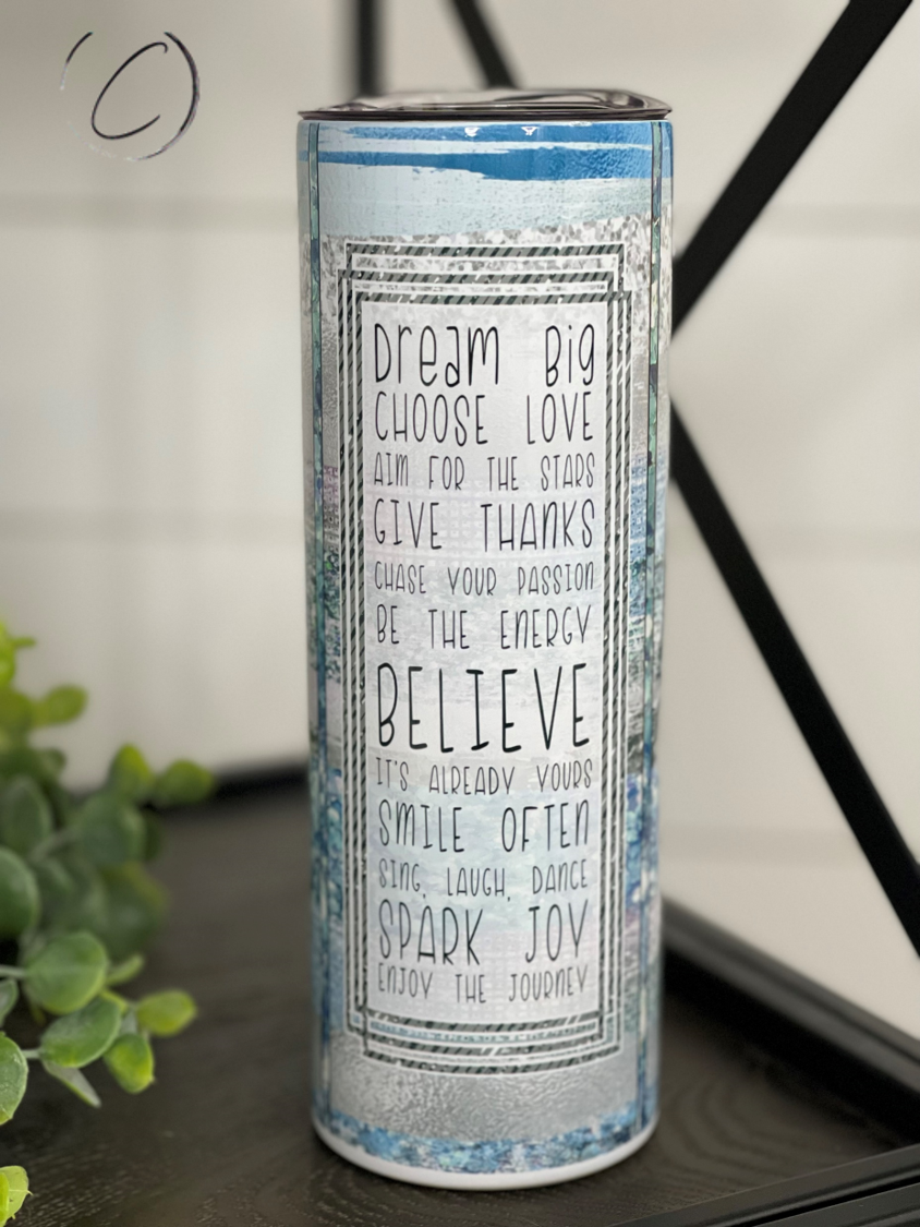 Inspiration 20oz Skinny Tumbler with a vibrant full wrap design, featuring a reusable straw and a sleek, modern shape.