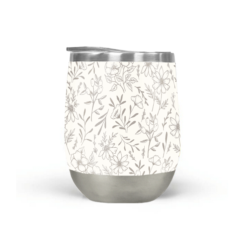 Ivory Flower Stemless Wine Tumbler showcasing its elegant design and stainless steel construction, perfect for outdoor use.