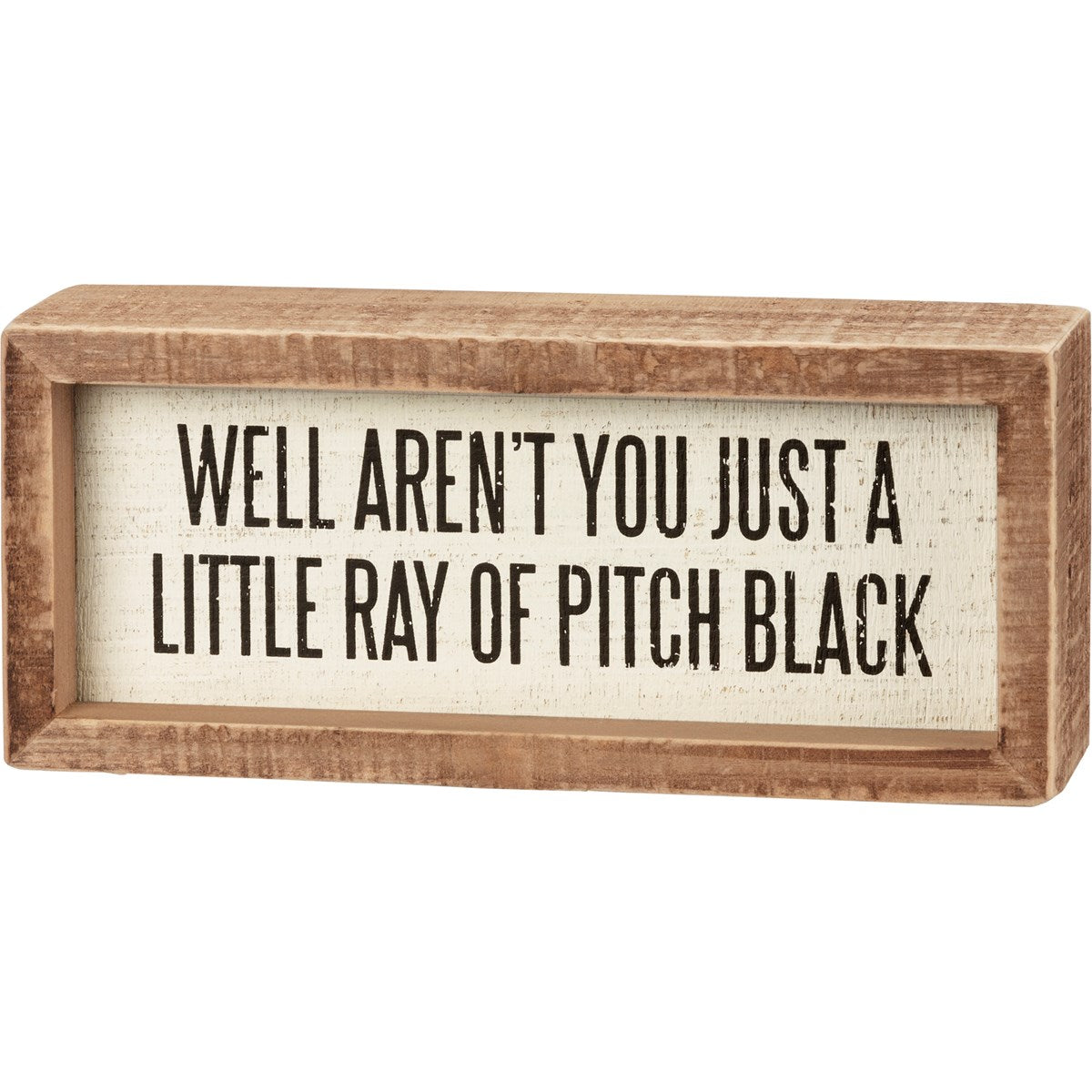 Inset wooden box sign with the quote 'Well Aren't You Just A Little Ray Of Pitch Black', featuring a rustic wood finish.