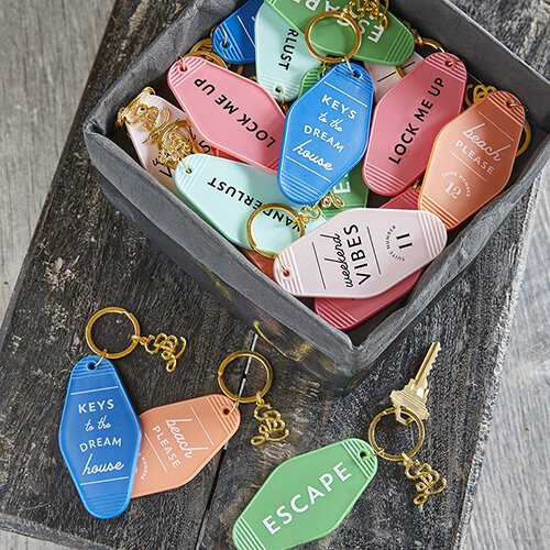 Keys To The Dream House Motel Style Keychain with gold hardware, featuring vibrant colors and trendy phrases, perfect for keys or handbags.