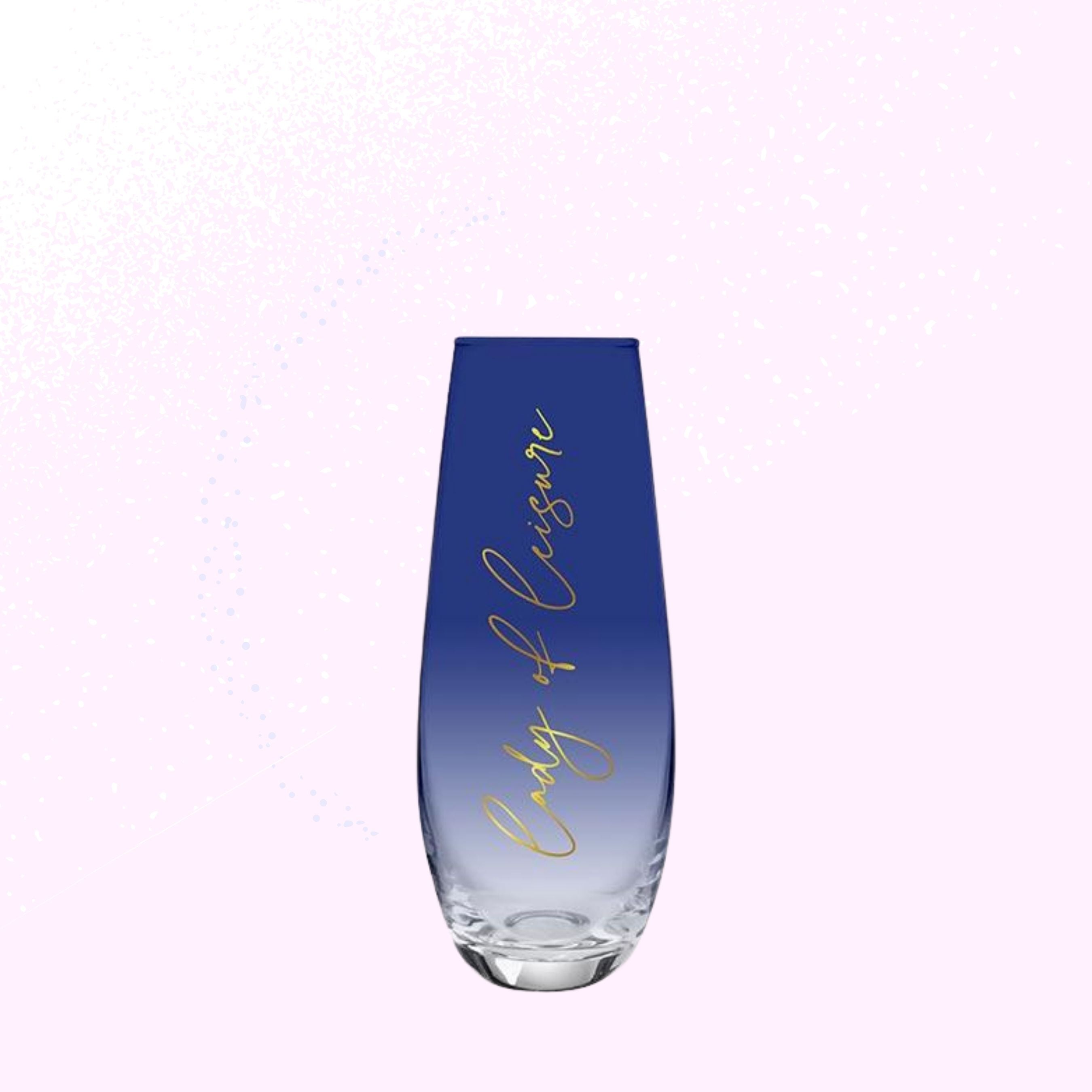 Lady of Leisure Stemless Flute Champagne Glass in dark blue tint with gold lettering, elegantly designed for champagne enjoyment.