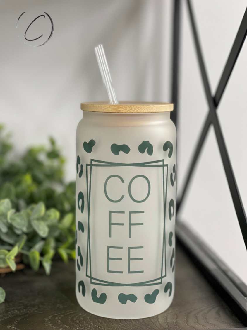 Leopard Coffee 16oz Libbey Glass tumbler with a vibrant leopard print design and reusable straw.