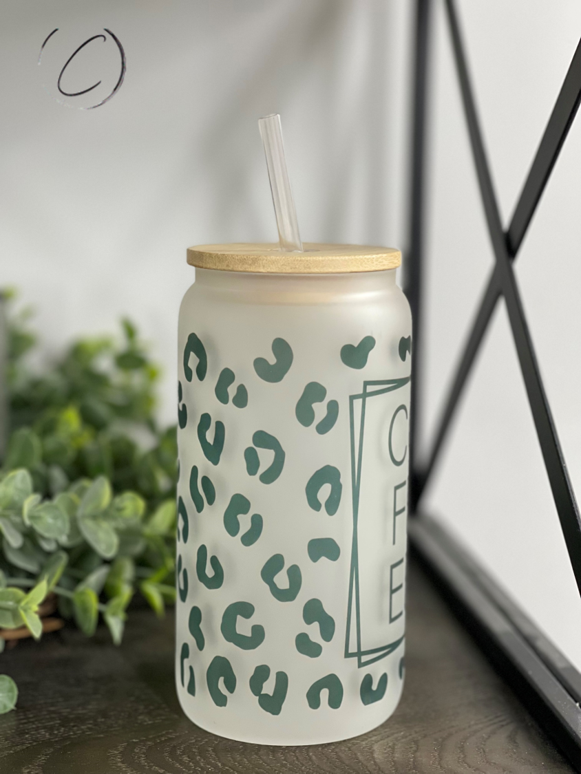 Leopard Coffee 16oz Libbey Glass tumbler with a vibrant leopard print design and reusable straw.