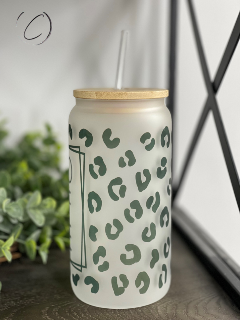 Leopard Coffee 16oz Libbey Glass tumbler with a vibrant leopard print design and reusable straw.