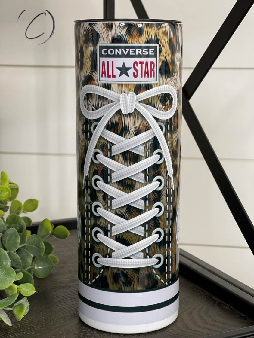 Leopard Converse 20oz Skinny Tumbler with a stylish leopard print design, featuring a reusable straw.