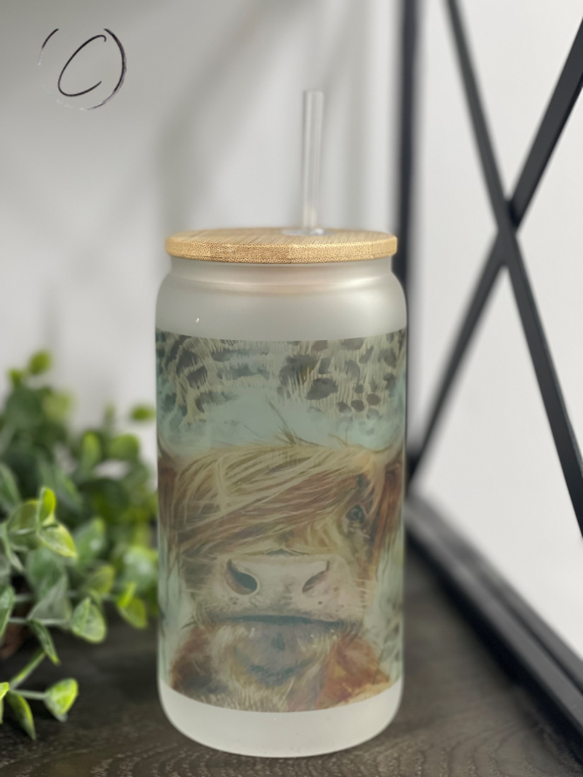 Leopard Highland Cow 16oz Libbey Glass tumbler featuring a unique design and reusable straw.