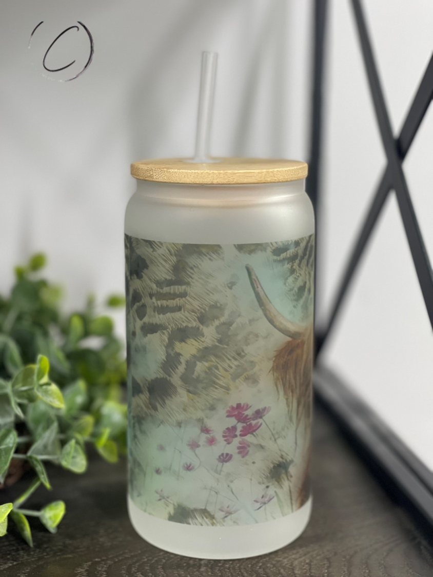 Leopard Highland Cow 16oz Libbey Glass tumbler featuring a unique design and reusable straw.