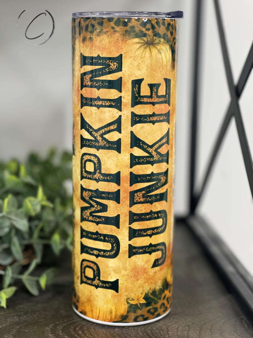 Leopard Pumpkin Junkie 20oz Skinny Tumbler with a vibrant leopard pumpkin design, perfect for stylish hydration.