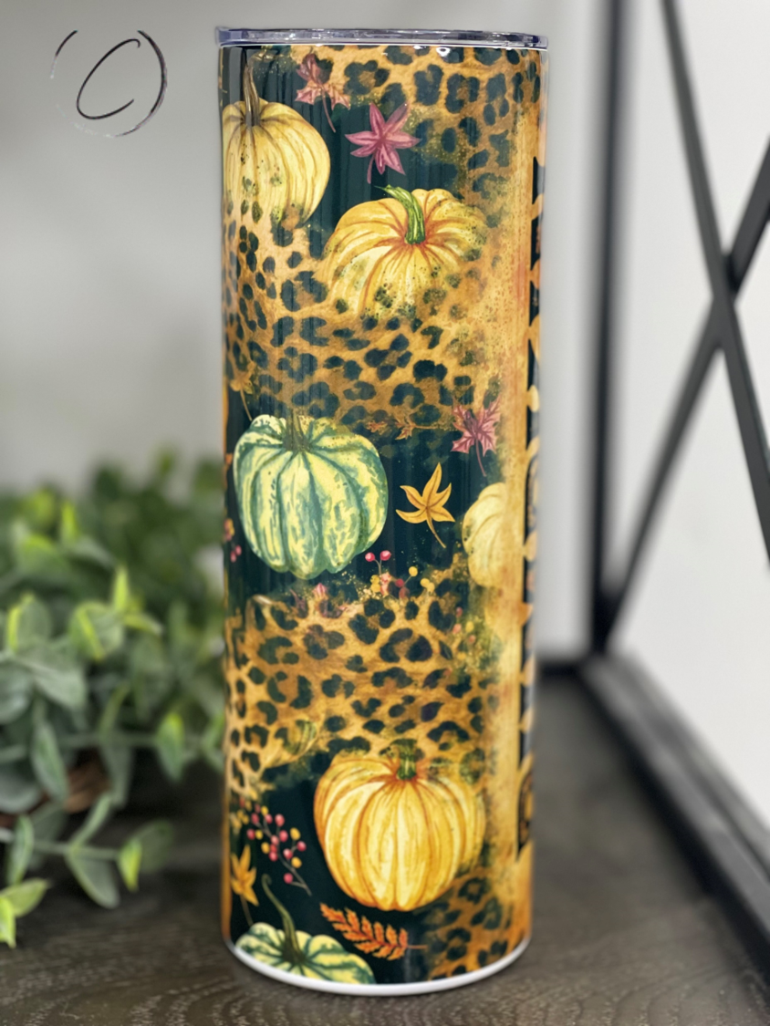 Leopard Pumpkin Junkie 20oz Skinny Tumbler with a vibrant leopard pumpkin design, perfect for stylish hydration.