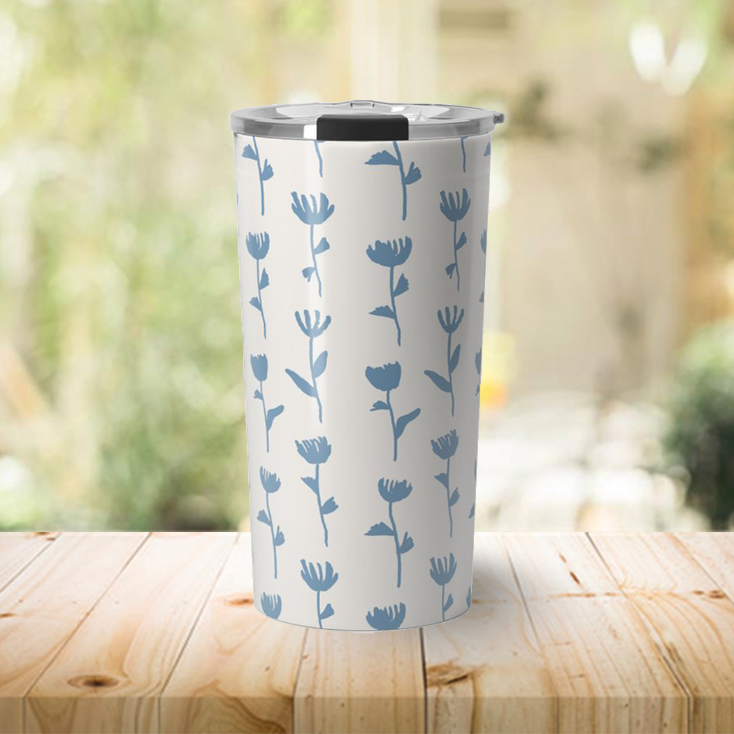 Light Blue Flower Travel Coffee Mug made of stainless steel with floral design, perfect for hot and cold beverages.