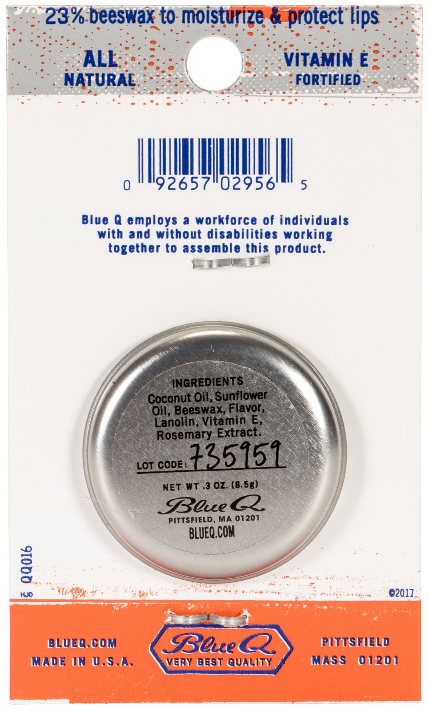 Lip Shit Lip Balm in Orange Mango, featuring a stamped metal tin and vibrant packaging, perfect for moisturizing lips.