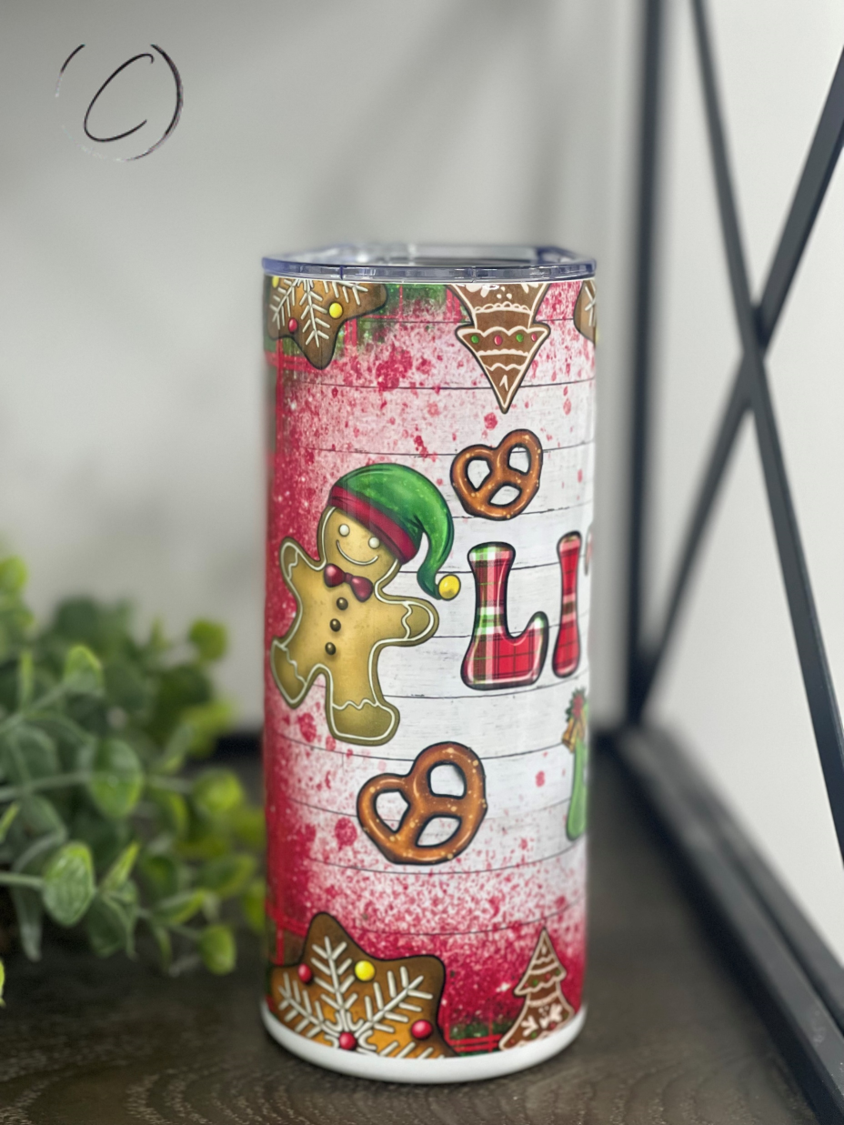 Little Elf 15oz Kids Skinny Tumbler featuring a vibrant design, reusable straw, and durable construction, perfect for children's beverages.