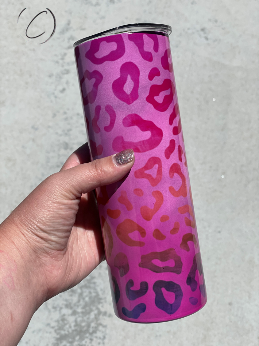 Marbled Ombre Leopard 20oz UV Pink Skinny Tumbler with a unique color-changing effect in sunlight, featuring a reusable straw.