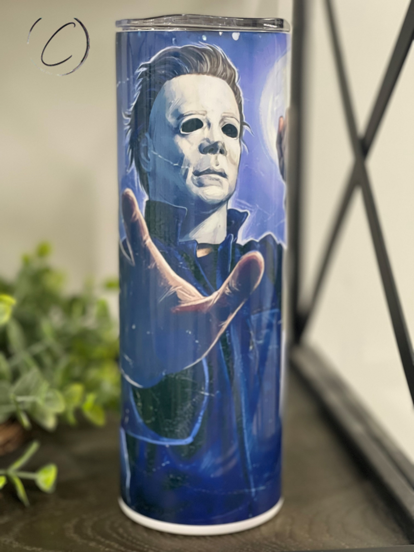 Michael Myers Bloody Paper 20oz Skinny Tumbler featuring a full wrap design with iconic horror imagery.