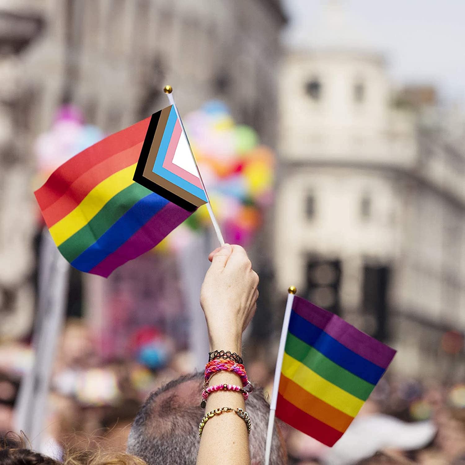 Mini Progressive Pride Flag headband made of soft cotton, featuring vibrant colors and an elastic design for comfort.