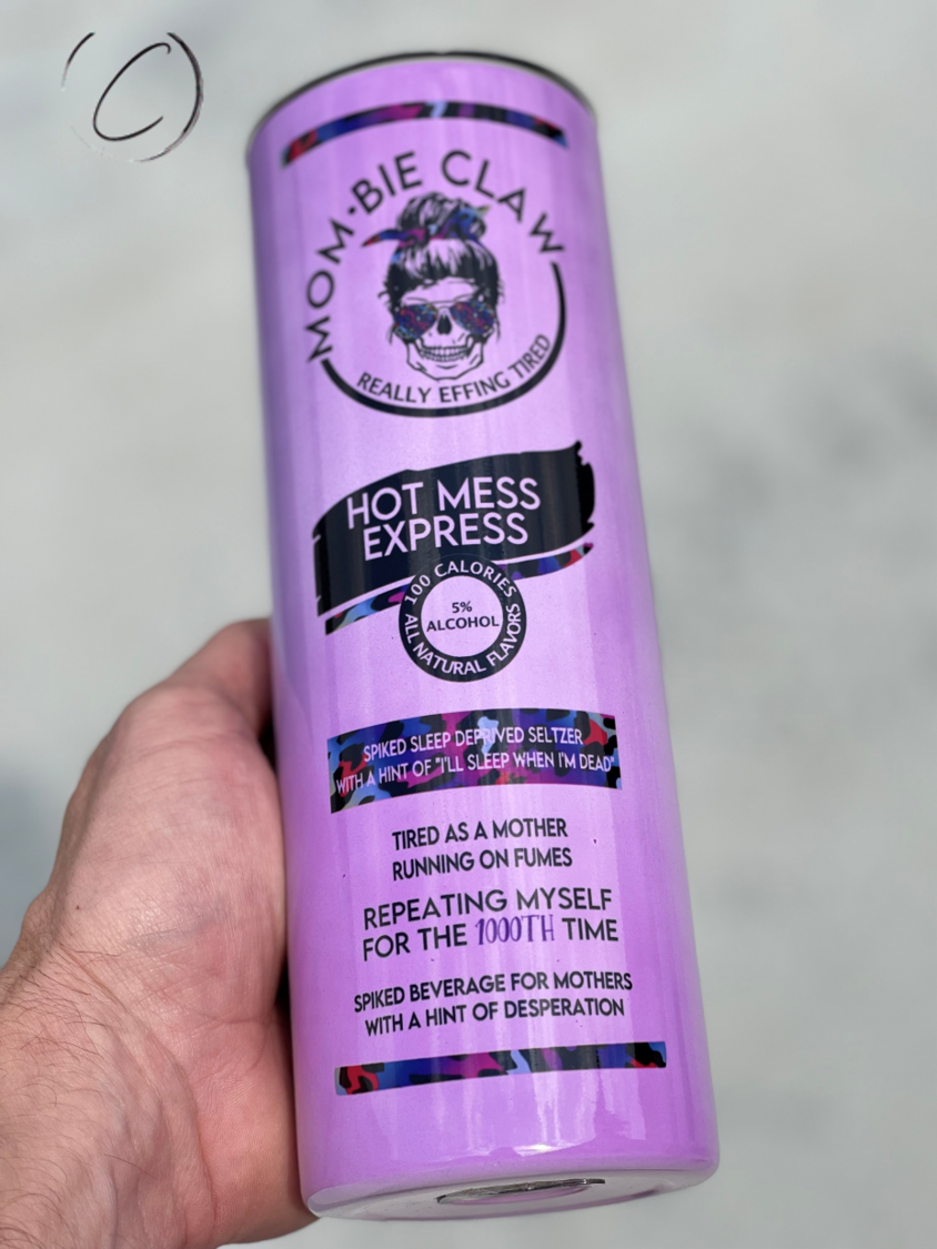 Mombie Claw 20oz UV Purple Skinny Tumbler showcasing its vibrant color-changing design in sunlight.