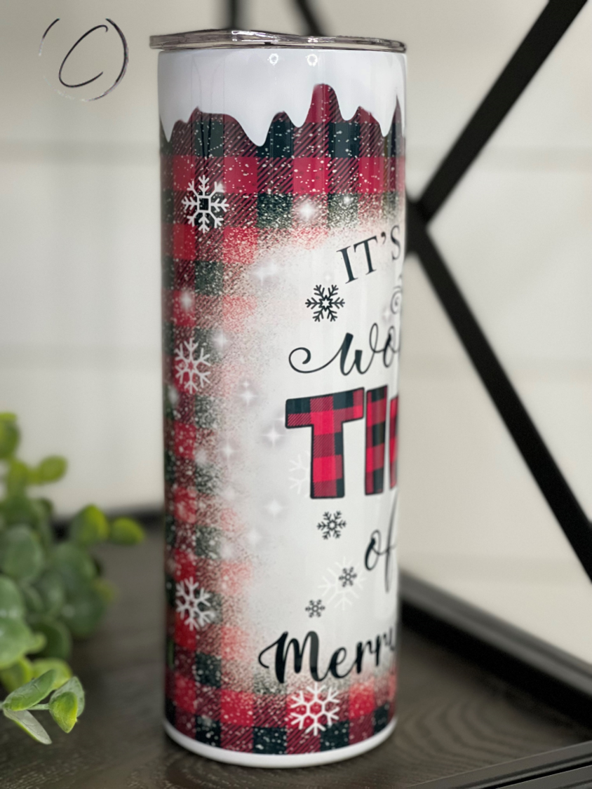 A stylish 20oz skinny tumbler featuring a buffalo plaid design, perfect for hot and cold beverages, includes a reusable straw.