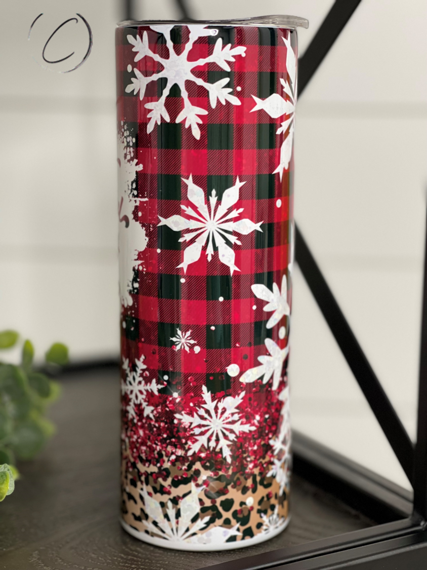 A stylish 20oz skinny tumbler featuring a leopard and plaid design, perfect for hot and cold beverages, with a reusable straw included.