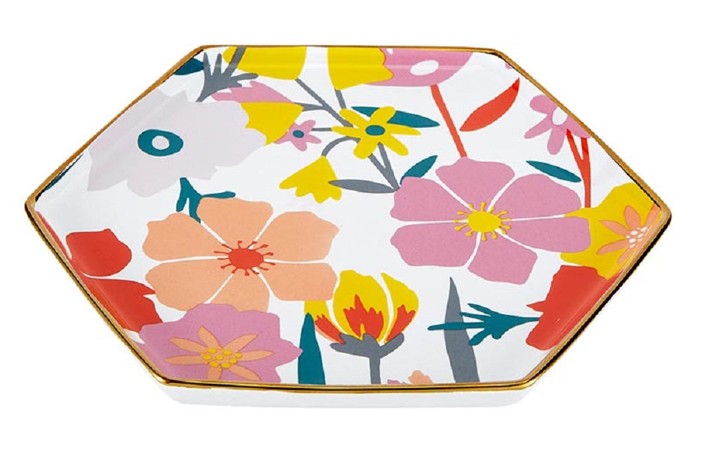 Never Stop Growing Hexagon Mug and Saucer Set featuring a floral design, perfect for stylish sipping.