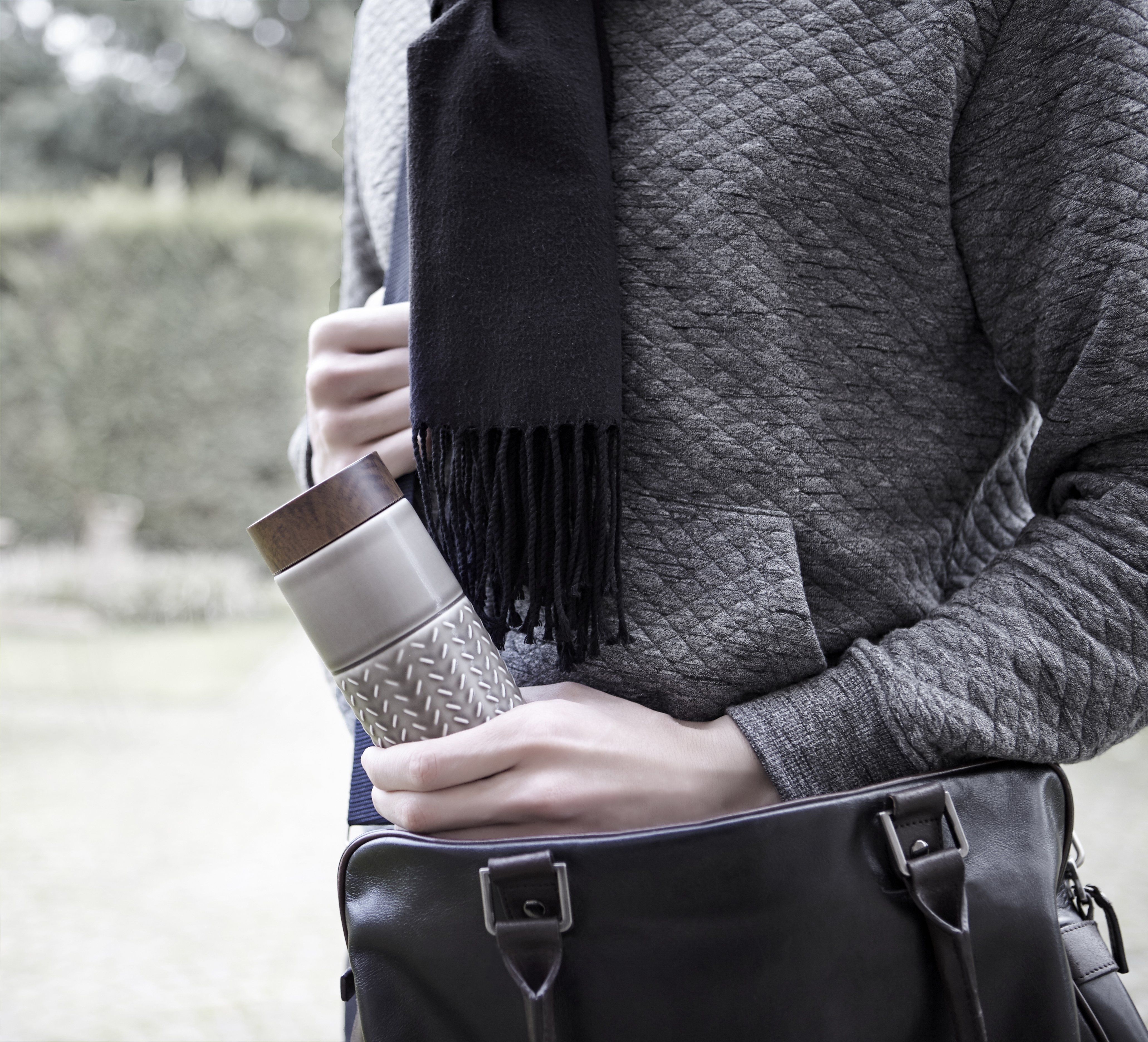 One-O-One Flying to the Clouds Tumbler showcasing its embossed checkered design, available in six trendy colors with a walnut wood-effect lid.