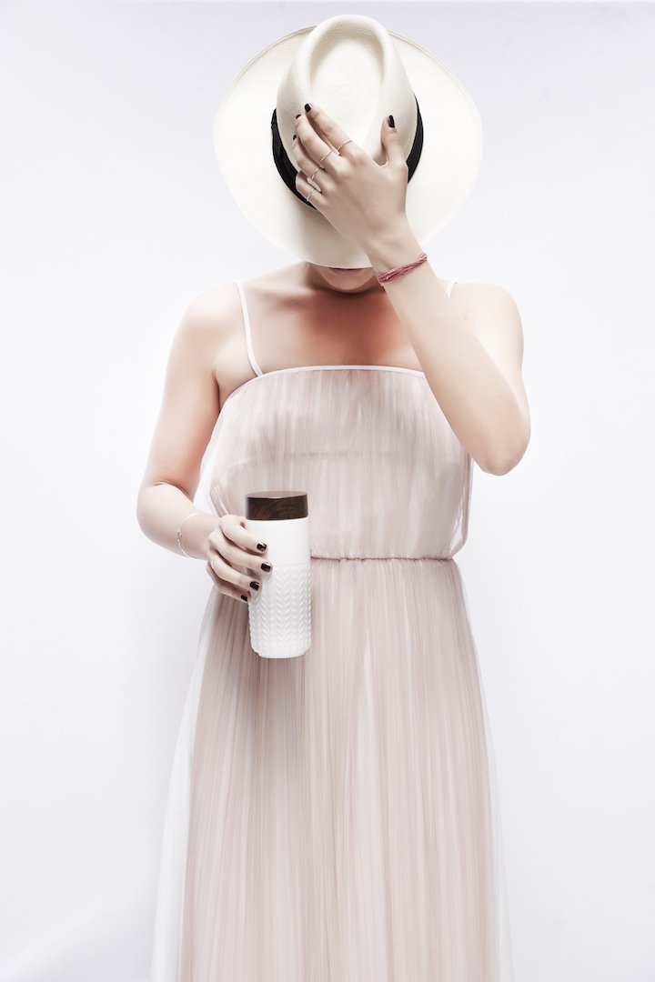 One-O-One Flying to the Clouds Tumbler showcasing its embossed checkered design, available in six trendy colors with a walnut wood-effect lid.