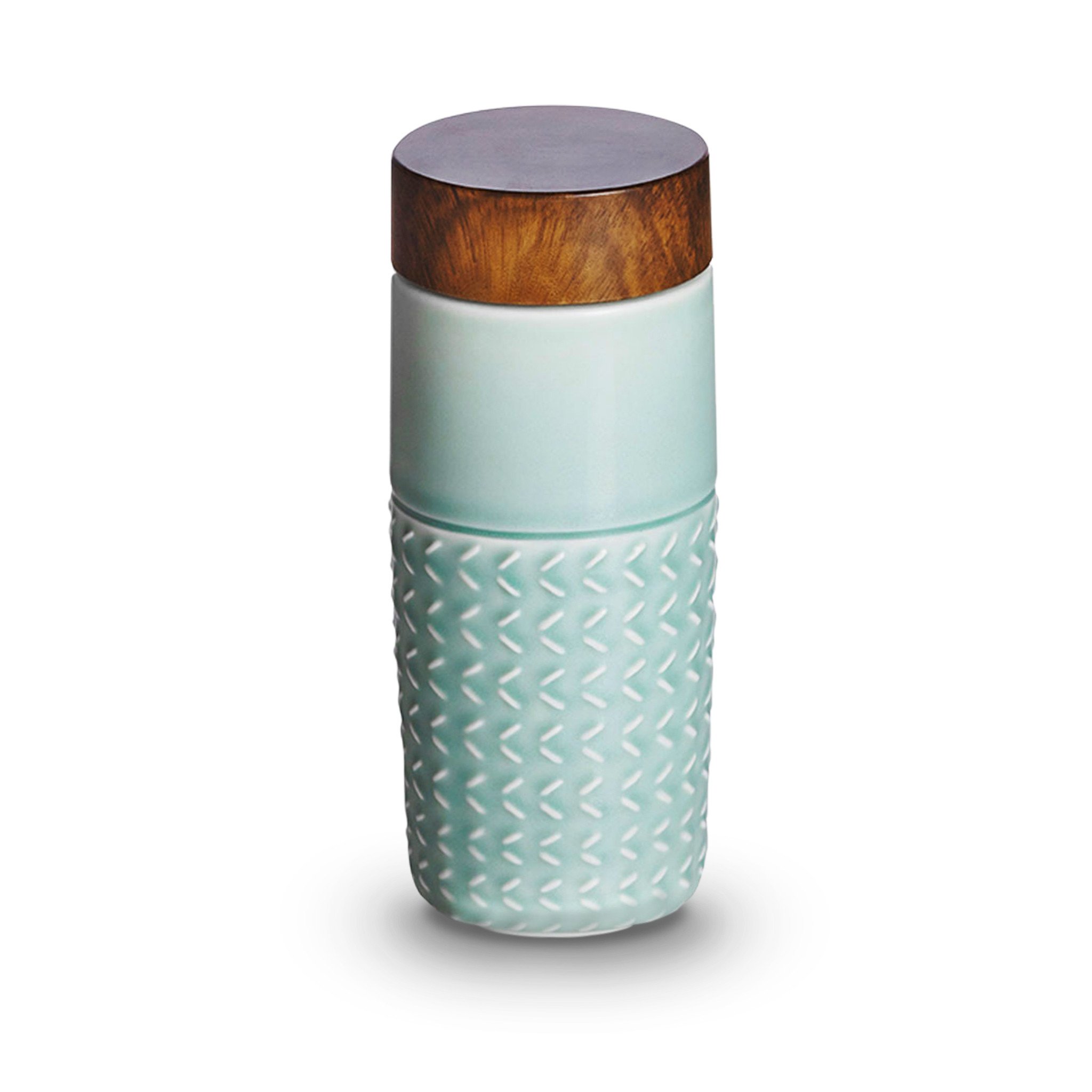 One-O-One Free Soaring Ceramic Tumbler showcasing its elegant design with raised starburst texture and walnut wood-effect lid.