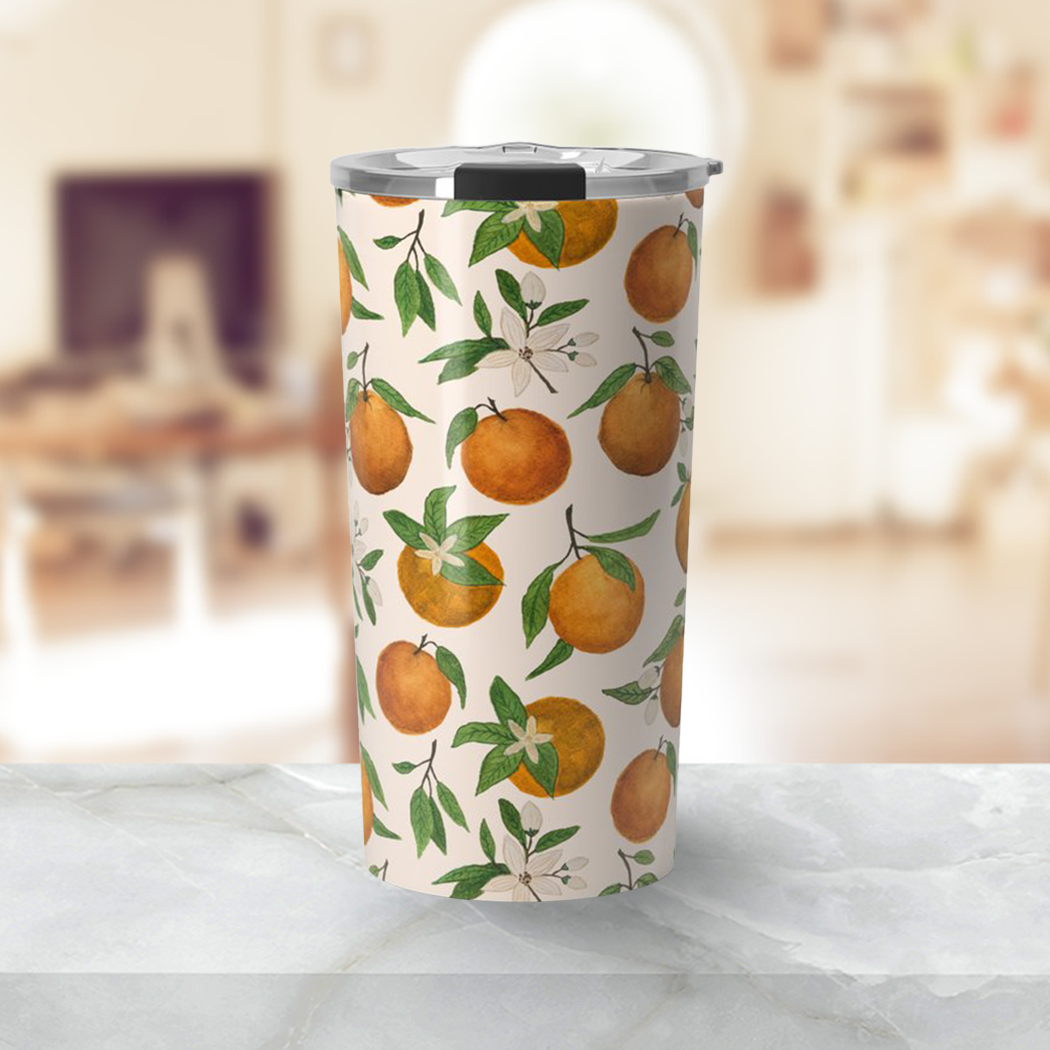 Orange Blossom Travel Mug with vibrant floral design, showcasing its stainless steel body and double-wall insulation.